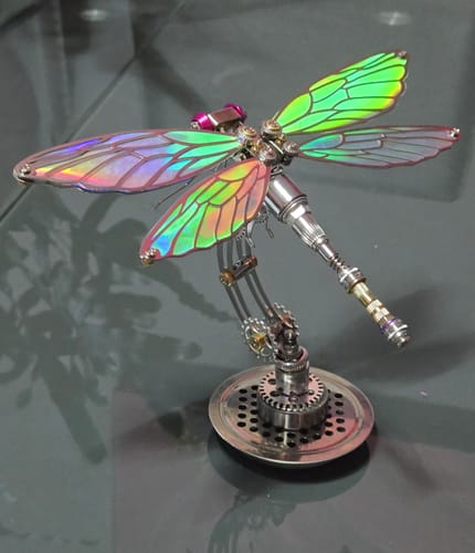 Reviewer's finished Dragonfly model on its display stand, showing the iridescent wings.