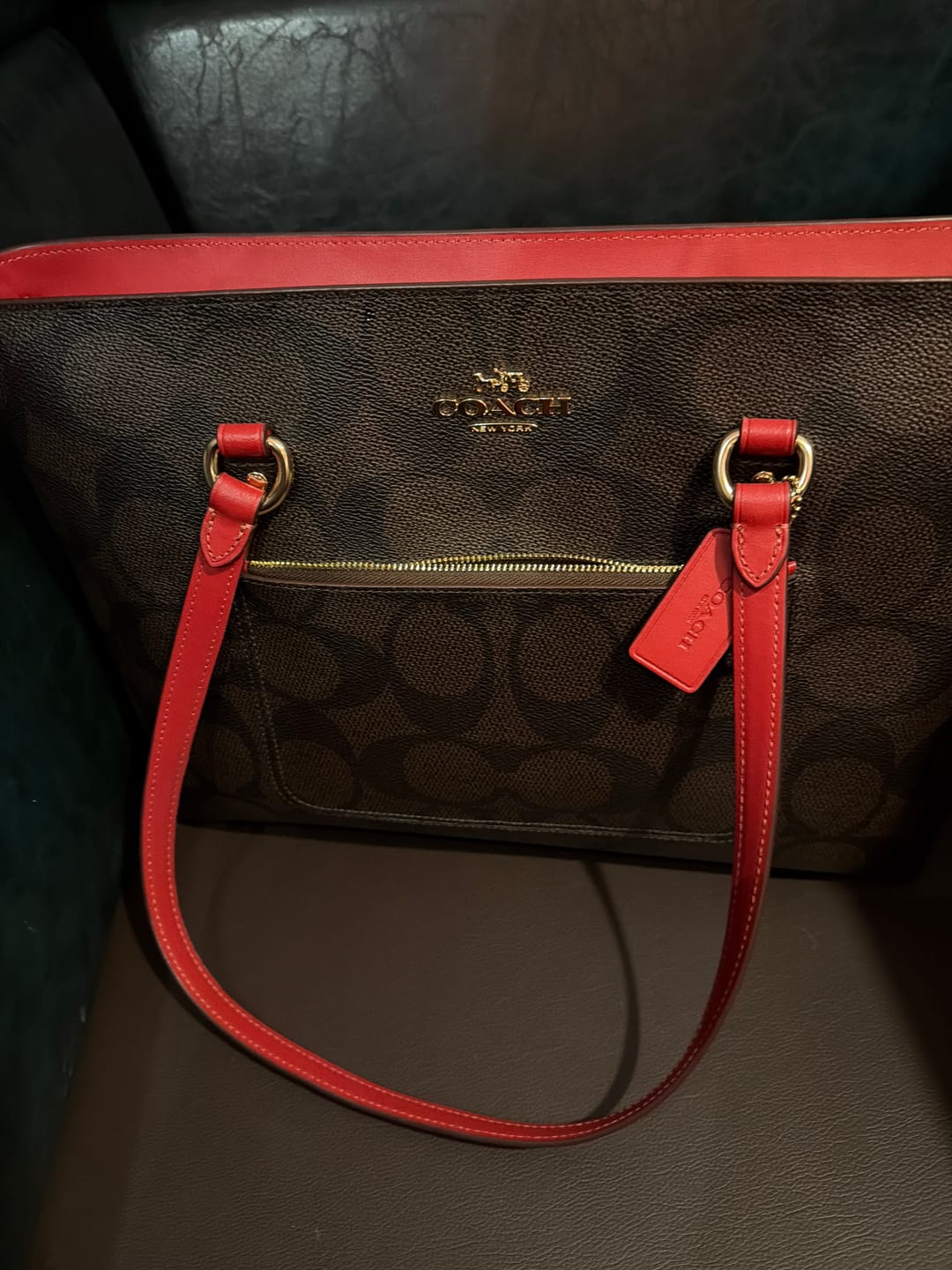 Customer photo review of Coach Women's Corner Zip Wristlet In Signature Canvas Gold/Bold Red