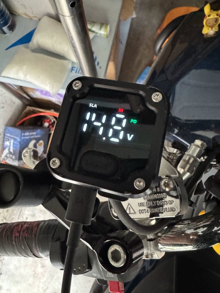 Customer photo review of C36 Motorcycle Bi-Directional Battery Charger – 100W PD Fast Charge, Real-Time Voltage Display, IP67 Waterproof, Lead-Acid Repair, Mirror/Adhesive Mount