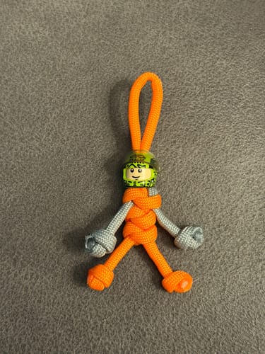 Customer photo review of Limited Edition 2025 Lando Norris Racing Paracord Buddy Keychain