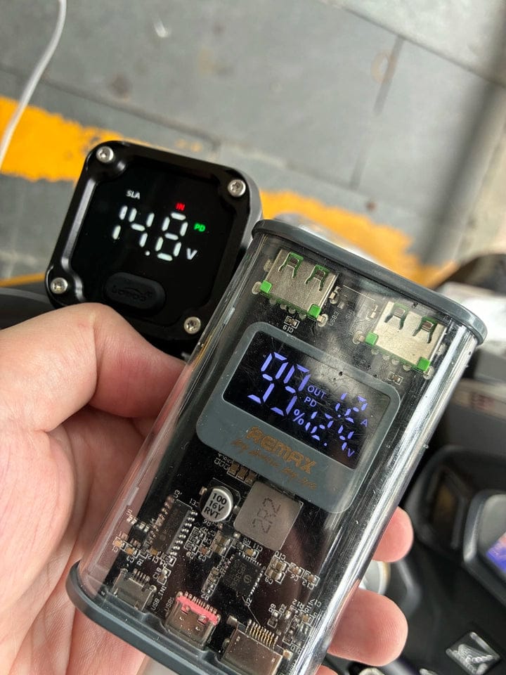 Customer photo review of C36 Motorcycle Bi-Directional Battery Charger – 100W PD Fast Charge, Real-Time Voltage Display, IP67 Waterproof, Lead-Acid Repair, Mirror/Adhesive Mount