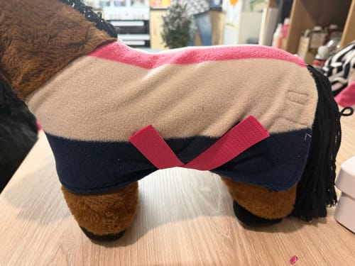 Customer's toy horse wearing a small rug made from the striped Cosy Stripe Anti Pill Polar Fleece Fabric.
