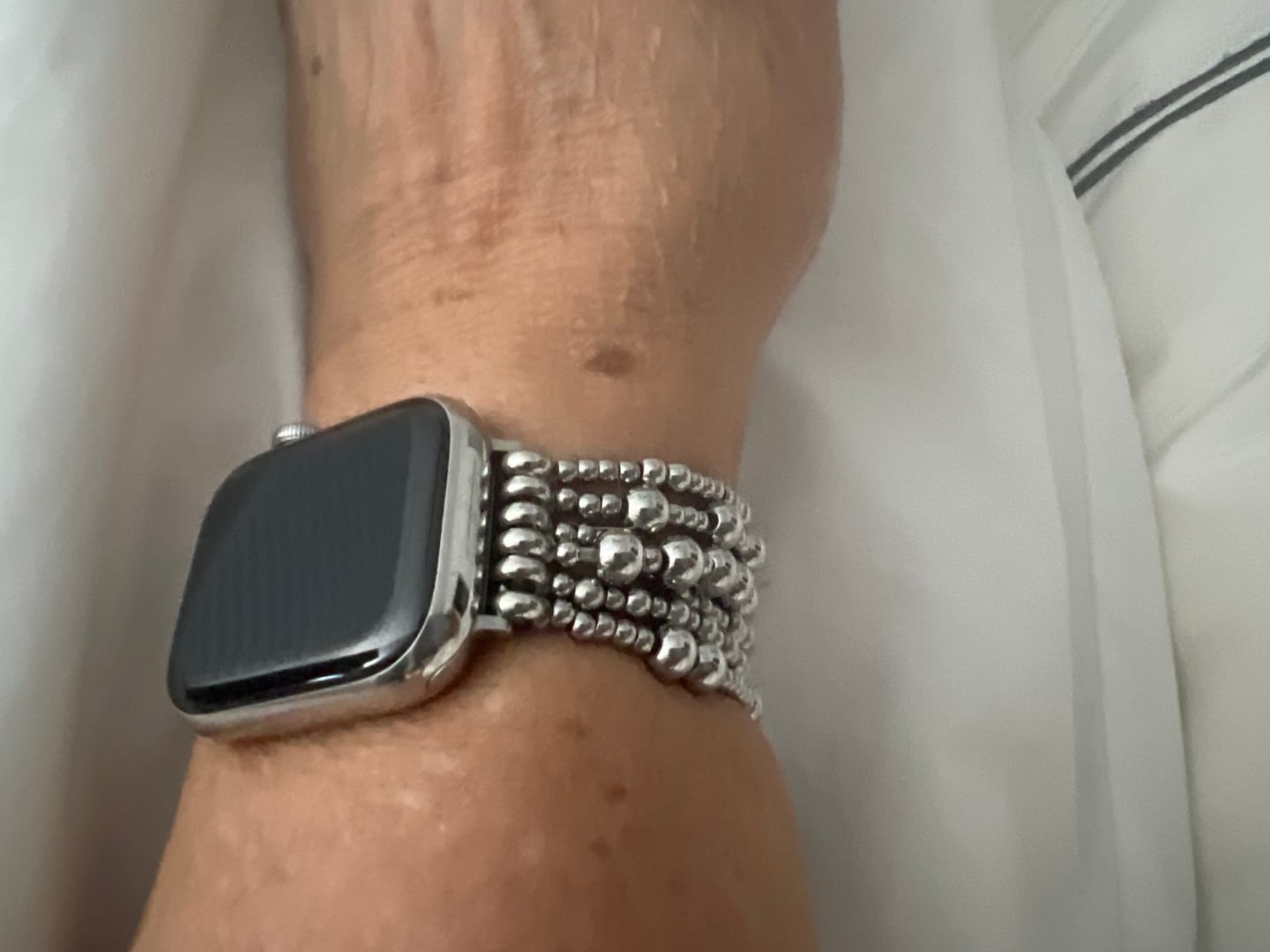 Customer photo review of Platinum Demure Stretch Apple Watch Strap