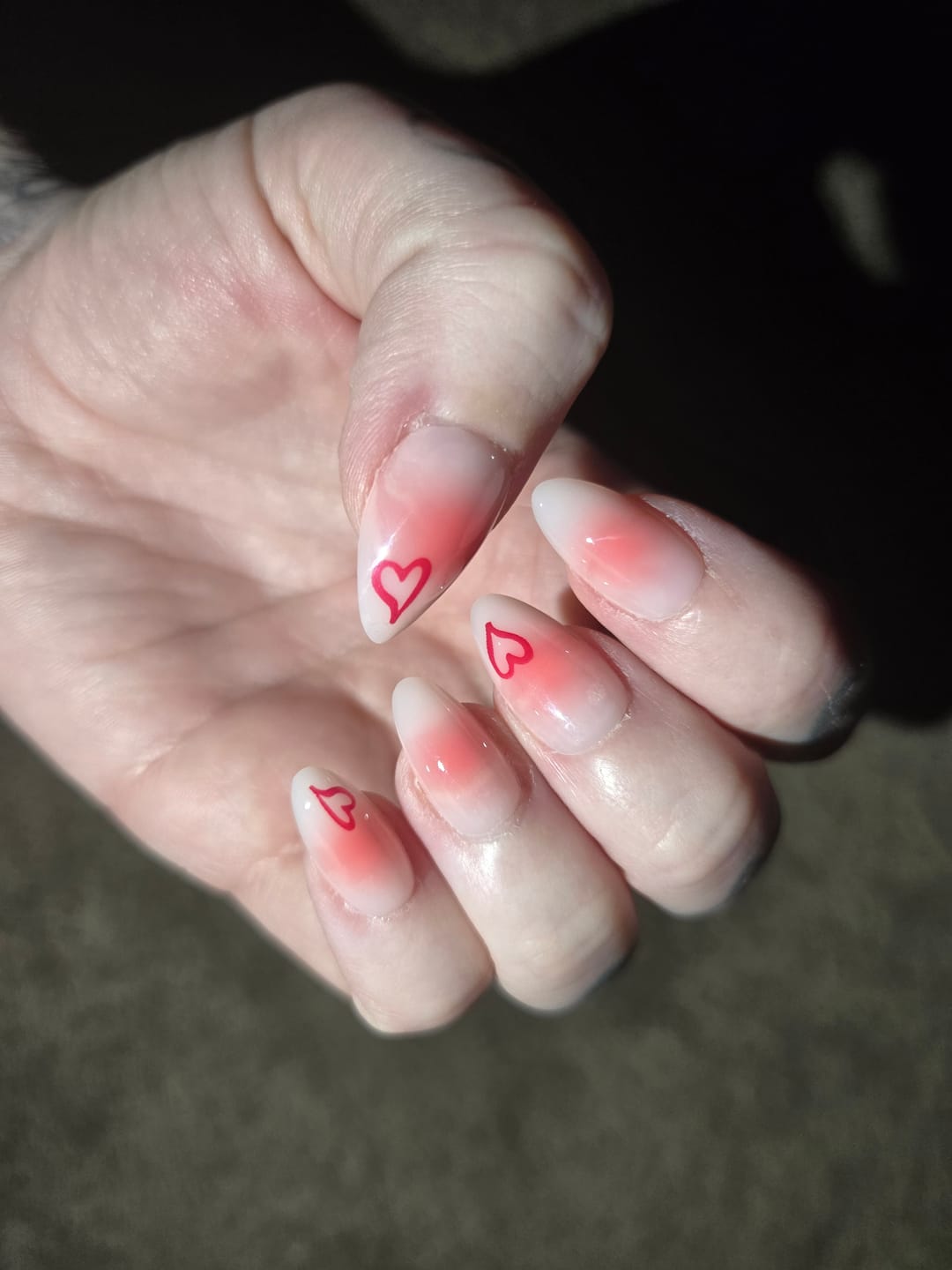 Customer photo review of Love Whisper | Salon Quality Press-on Nails - Short Almond Ombre with Heart Accents