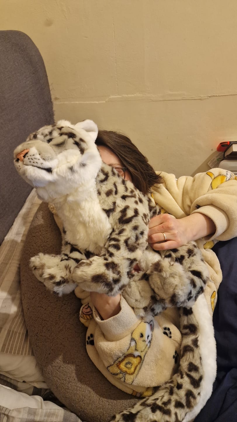 Customer photo review of Snow Leopard Cat Soft Stuffed Plush Toy