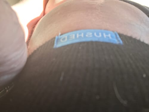 Close-up: Reviewer wearing dark Performance Eucalyptus Compression Socks, showing the top cuff.
