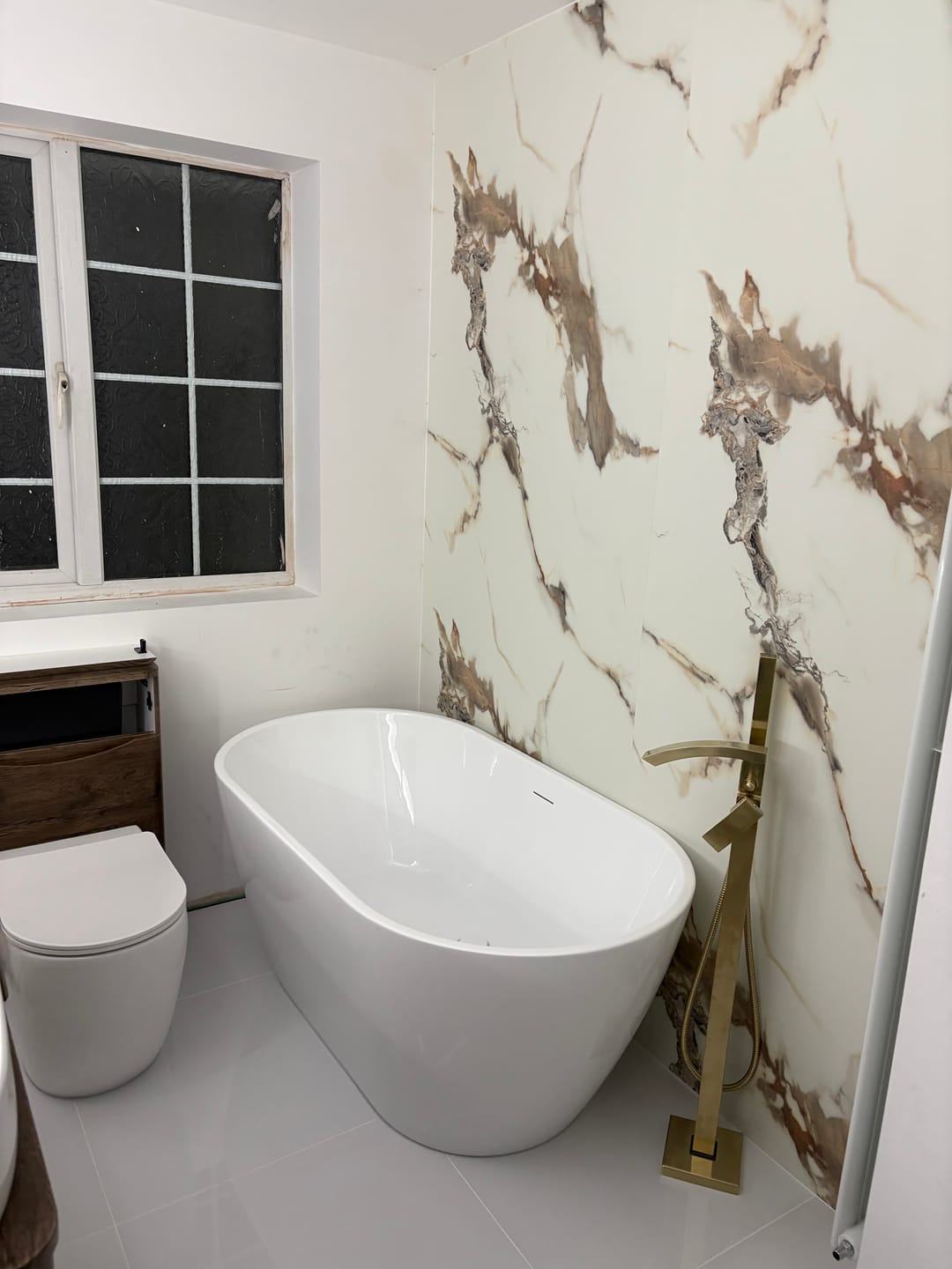 Customer photo review of 10mm Calacatta Marble Ultra Matt Shower Panel 1M x 2.4M