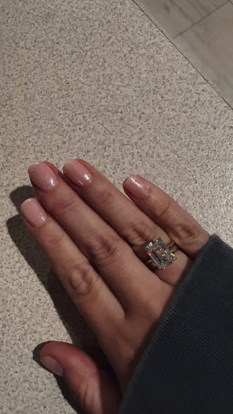 Customer photo review of 5.0 Carat Yellow Gold Emerald Cut Solitaire Engagement Ring