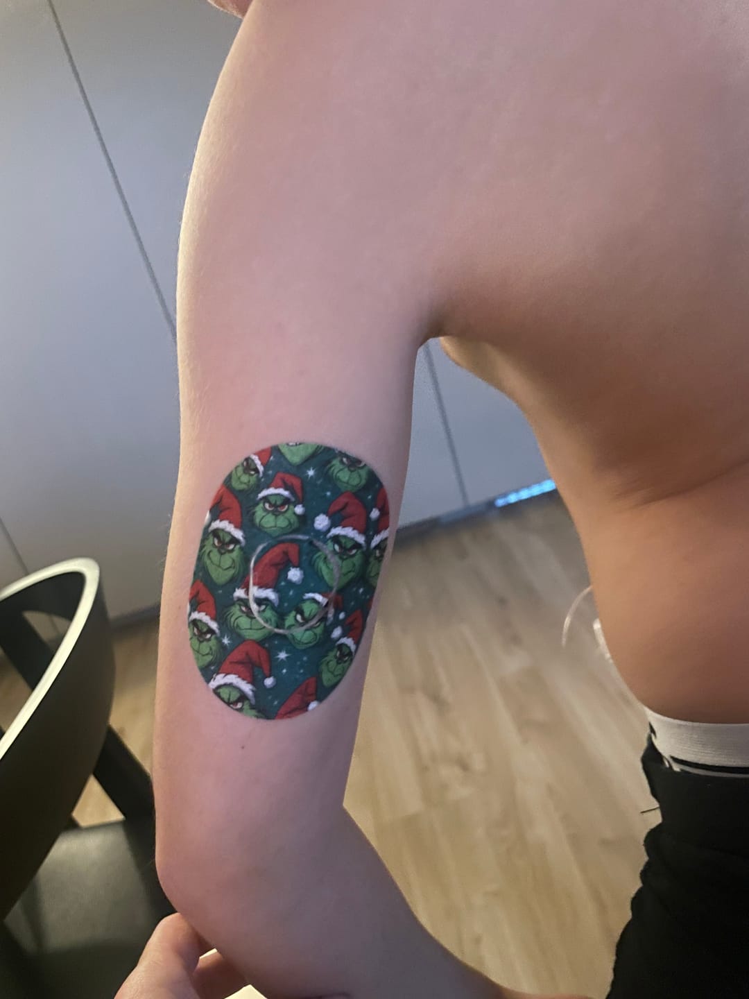 Customer photo review of Dexcom G7 The Grinch Christmas CGM Sensor Patches ink. Sticker