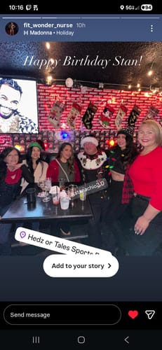 Customer wearing the Krampus Christmas Button Up shirt at a festive party with friends.