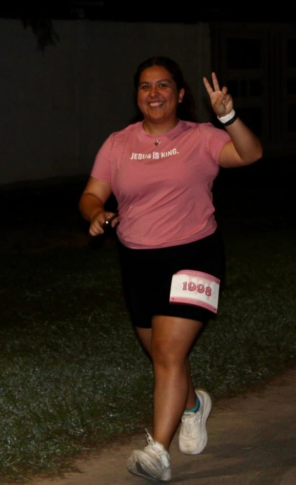 Customer photo review of Women's Jesus Is King Performance Tee