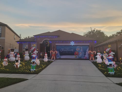 Customer photo review of Snowman Merry Christmas And Happy New Year Garage Door Cover Banner Backdrop