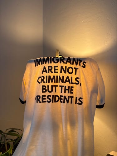 Customer photo review of Immigrants Premium Unisex T-Shirt