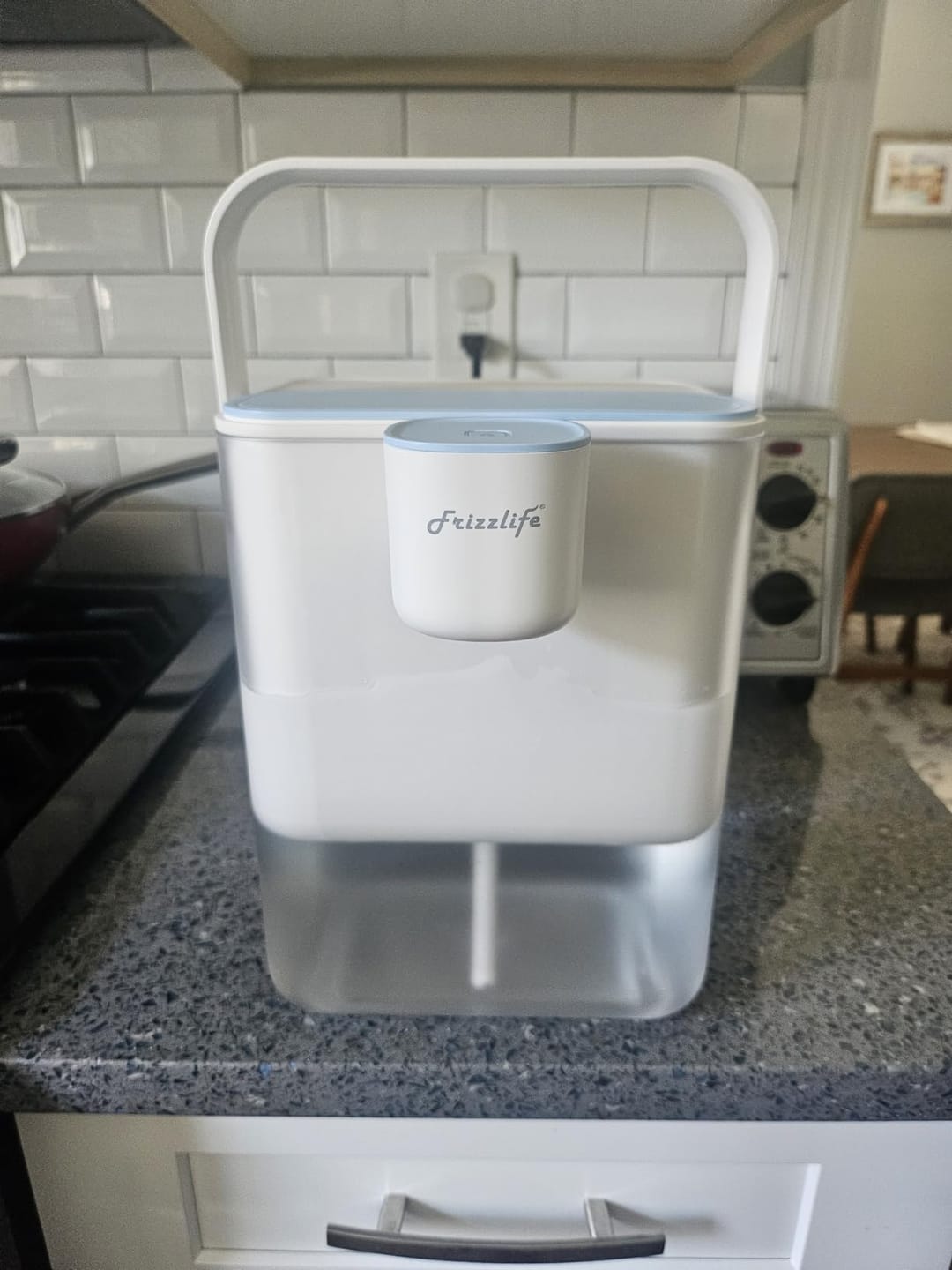 Customer photo review of Frizzlife 400-Gallon Electric Water Filter Dispenser with 2 Filters (8-Stage Filtration),Reduce 99.89% of Lead,6 Months Rechargeable Water Pitcher, BPA-Free Instant Countertop Water Filter System,MD40