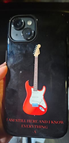 Customer's custom black iPhone 14 case with a red electric guitar and text design.