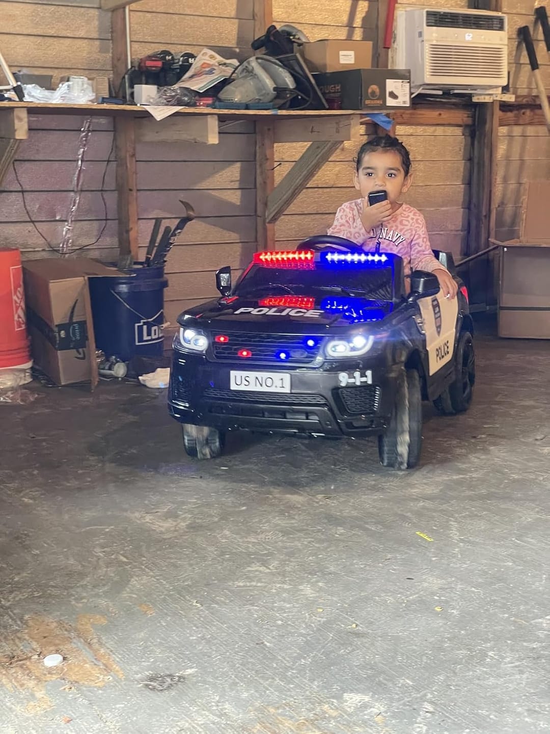 Customer photo review of TOBBI 12V Electric Kids Ride On Toy Police Car