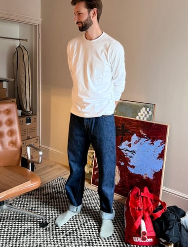 Reviewer showing the fit of the dark 1966 Selvedge Denim Jeans, worn with rolled cuffs.