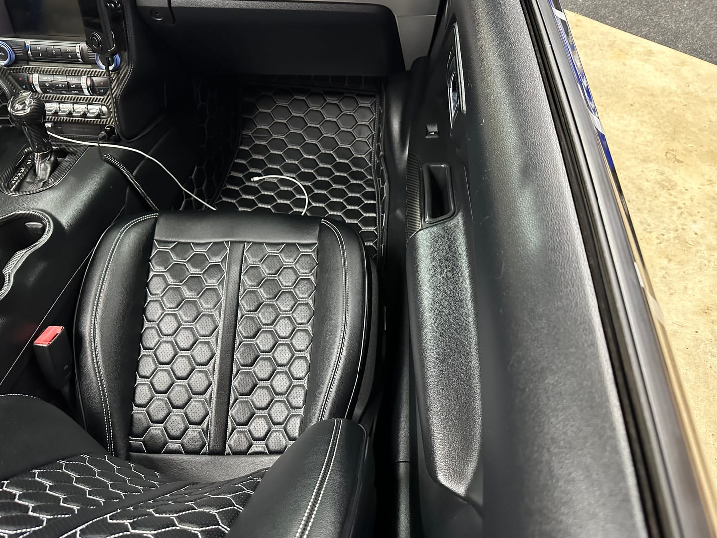 Customer photo review of 2015+ Ford Mustang Honeycomb Leather Floor Mat