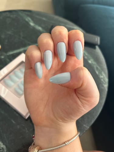 Customer photo review of Glacial Glow | Salon Quality Press-on Nails Kit- Medium Almond Cat-Eye Blue