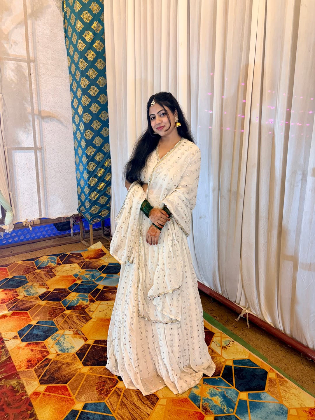 Customer photo review of Astoria Ivory Mirror Work Lehenga Set