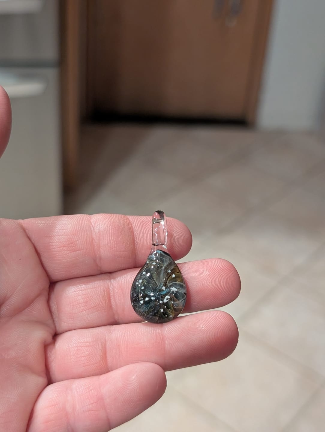 Customer photo review of Ghost Pendant with Infused Cremation Ashes