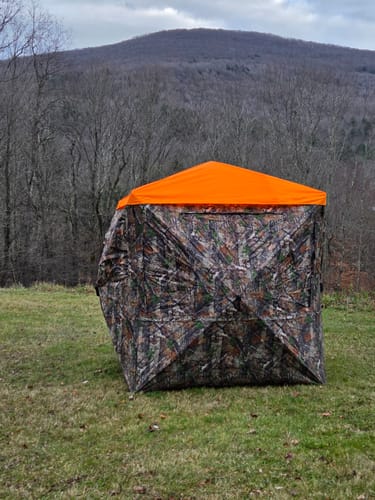 Michael H. review of VisMaster 3-4 Person See Through Hunting Blind | 270° Portable Pop Up Deer Blinds | Blaze Orange Weatherproof Ground Blind with No-Trip Door image 1 out of 4