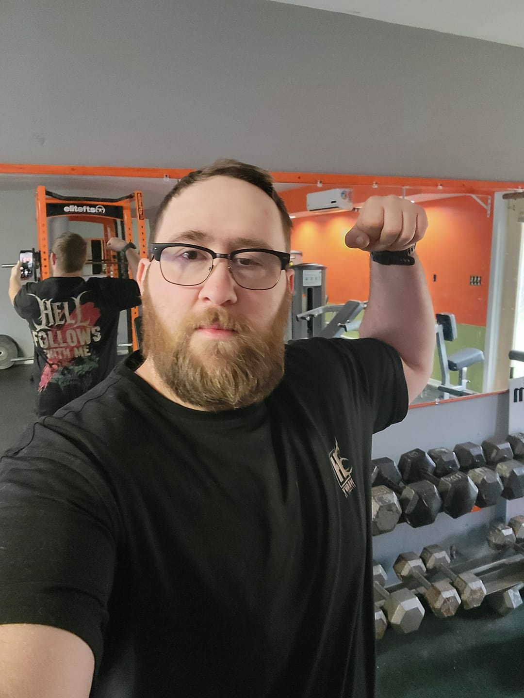 Customer photo review of Hell Follows With Me Fitted Tee