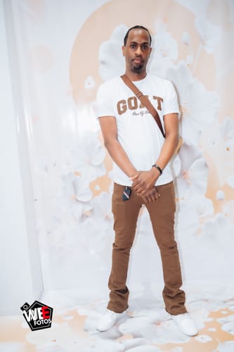 Customer wearing the Four Point Stacked Denim in a dark brown wash, showing the skinny fit.