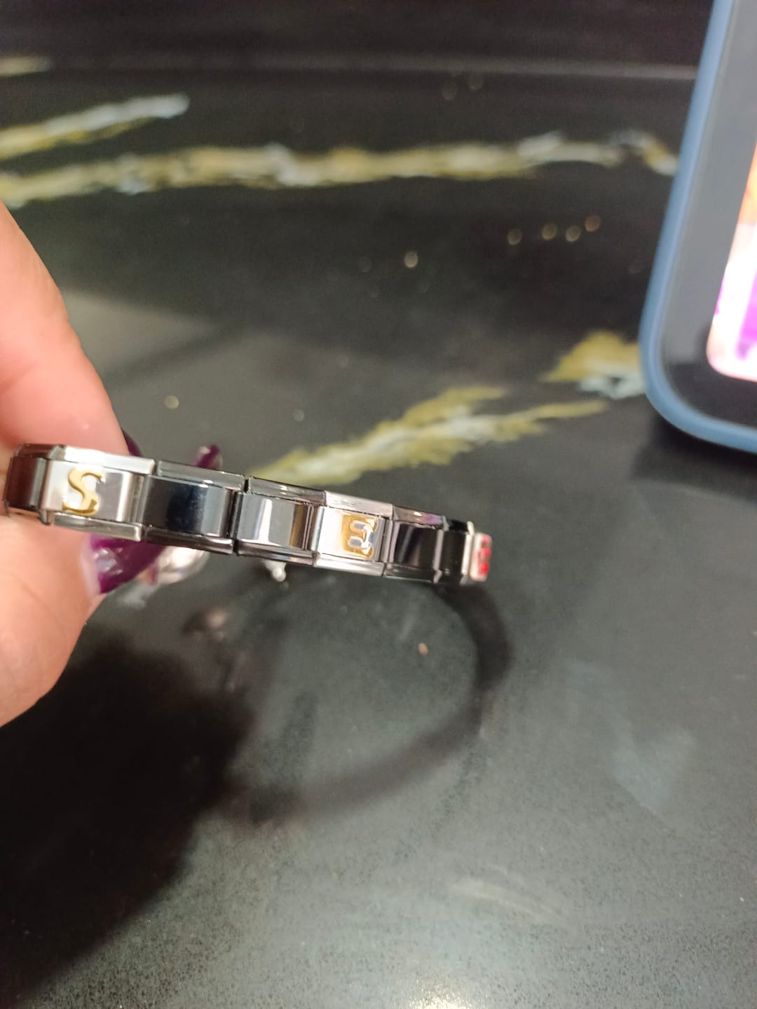 Customer photo review of Charm Letra E