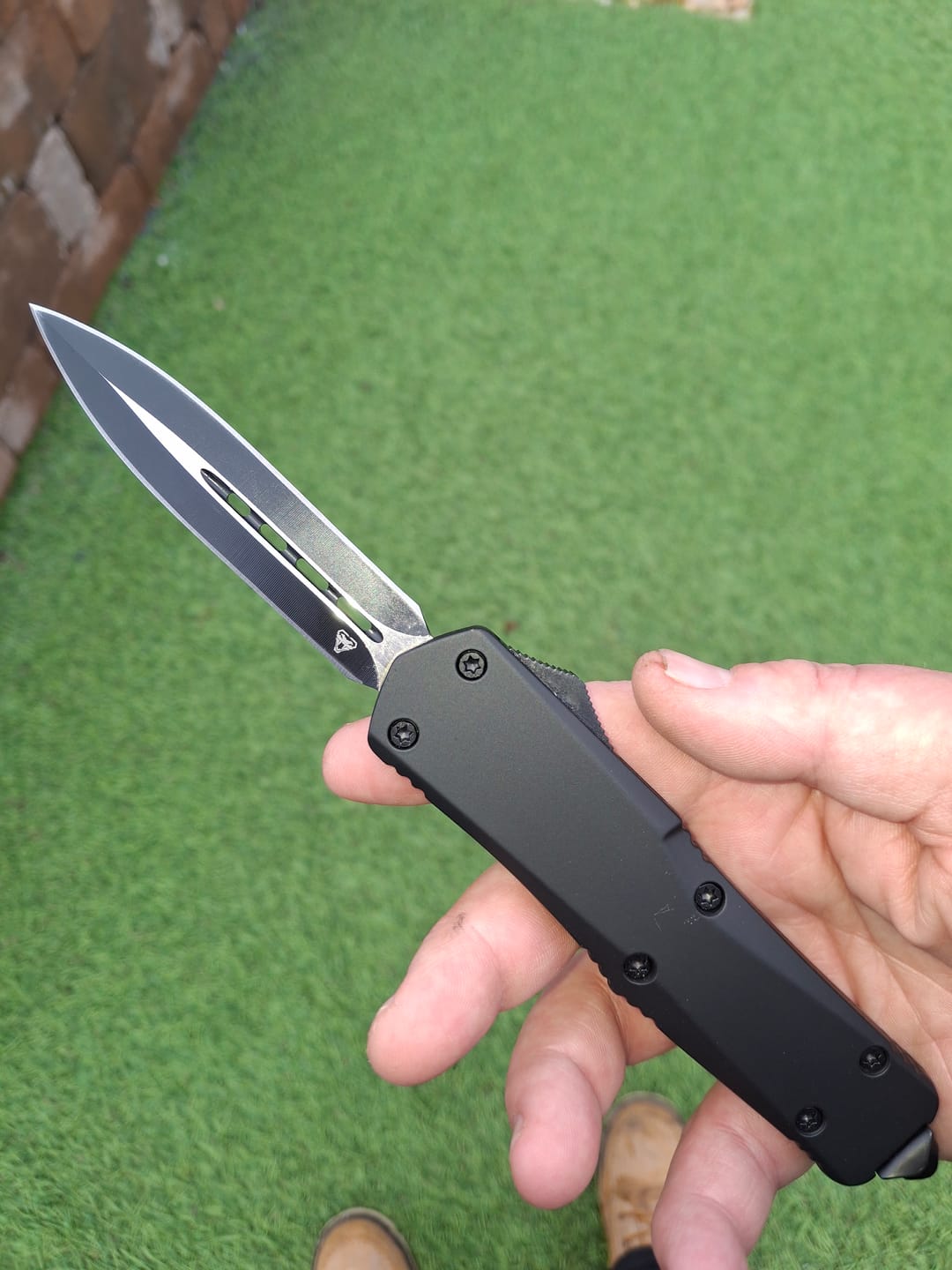 Customer photo review of Black Ghost OTF Knife (Multiple Blade Styles Available)