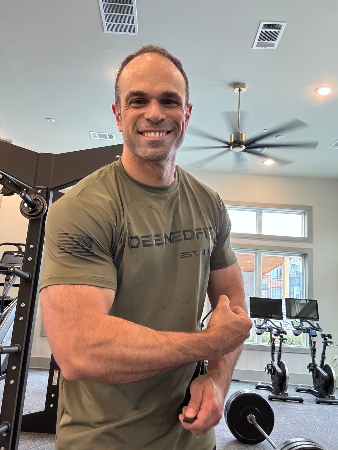 Customer photo review of Men’s Gym Tee “Compellence” -Olive