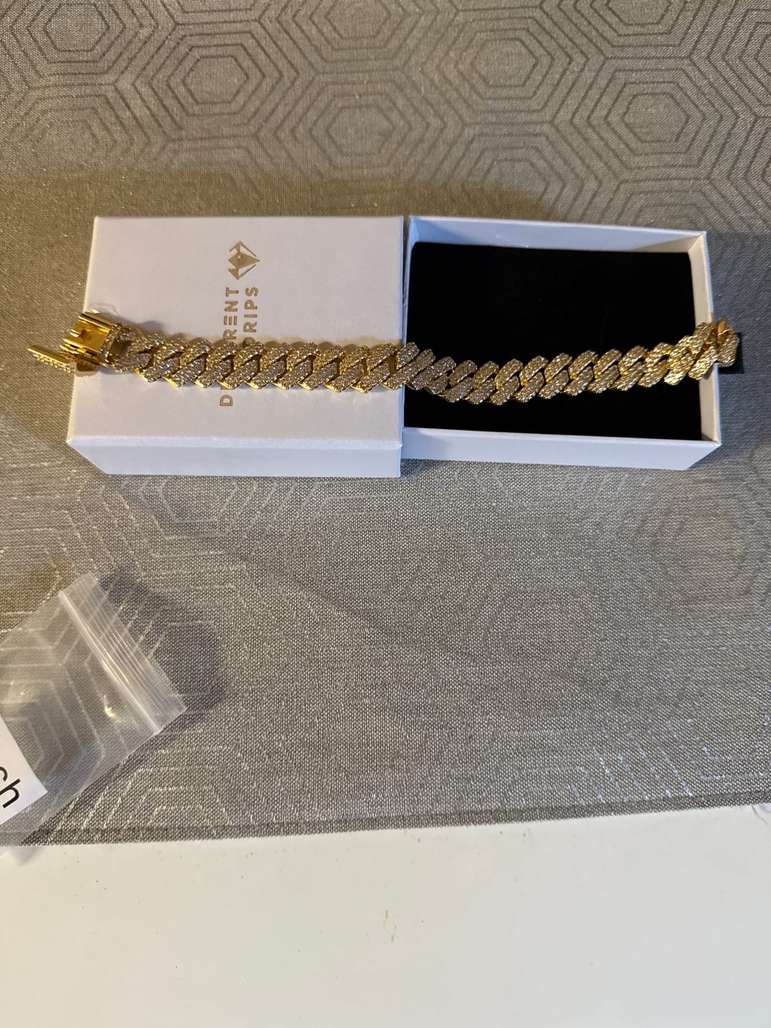 Customer photo review of 12mm Iced Prong Cuban Link Bracelet