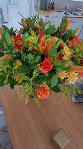 Customer photo review of Bright Orange Glass Vase