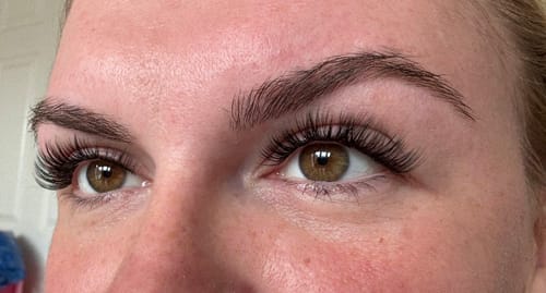 Close-up of a reviewer's eyes wearing the long, full Classique lash clusters.