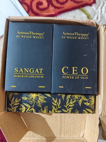 Customer shows the packaging for their CEO Power of Oud perfume in its black box inside a shipping carton.