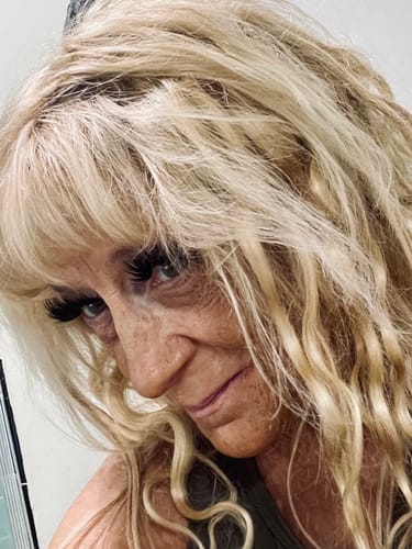 Reviewer's close-up showing long, full eyelashes applied with Bondage® Extra Strength Bond.