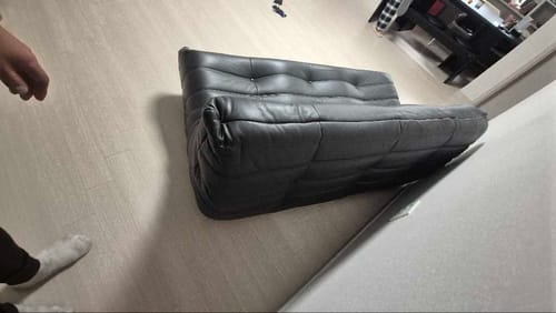 Customer photo showing Togo settee upholstery texture and stitched channels