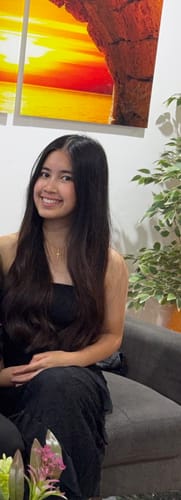 Reviewer's daughter smiling, showing clear, calm skin after using the Teen Skincare Essentials.