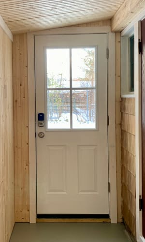 Reviewer's white door transformed with the Clear 4 Lite Glass Kit, letting bright light into a home office.