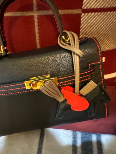 Customer photo review of Pony Grey/Brown Keychain