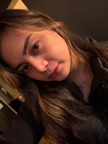 Reviewer's close-up selfie showing radiant skin and healthy hair after using Marine Collagen.