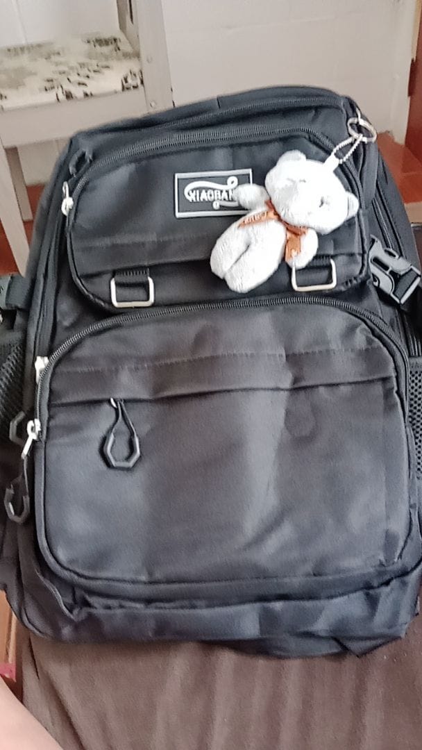 Customer photo review of Mochila Unissex Impermeável com porta-chaves Versátil