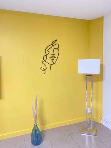 Customer photo review of Décoration Murale en Métal - Femme aux cheveux bouclés
