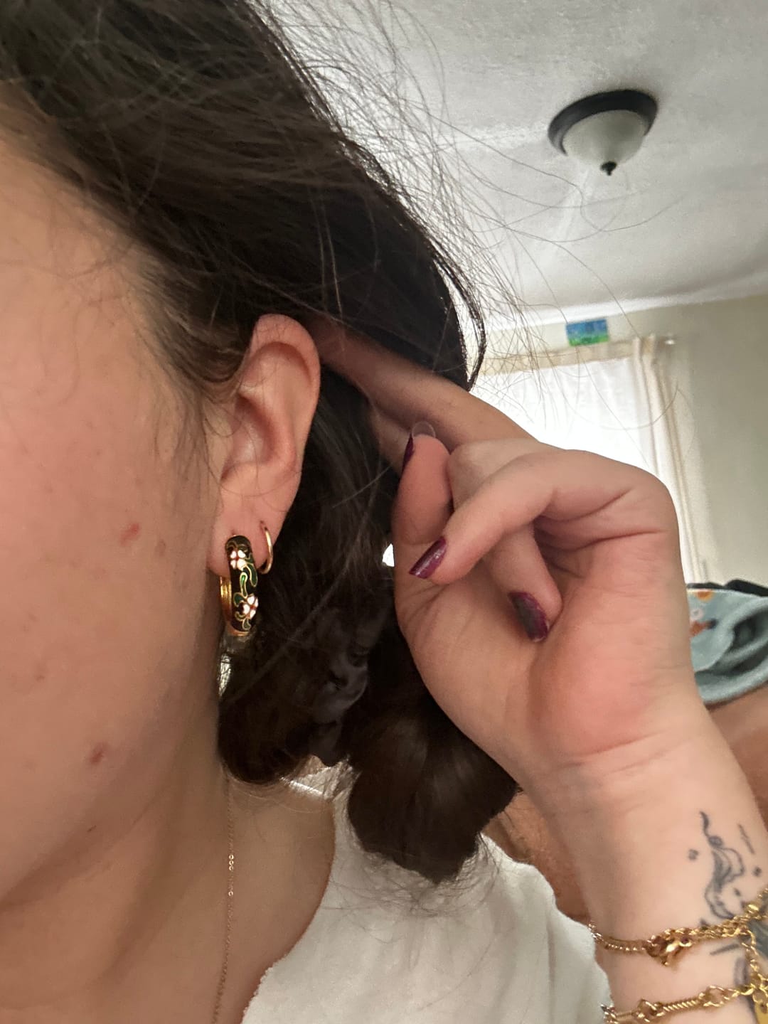 Customer photo review of Black Gold Hoop Flower Earrings