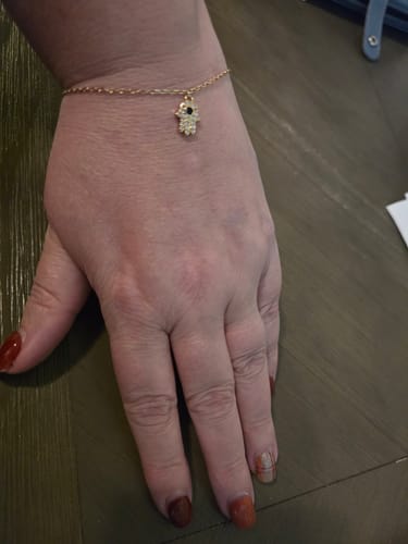 Customer photo review of 10K Gold Permanent Bracelets