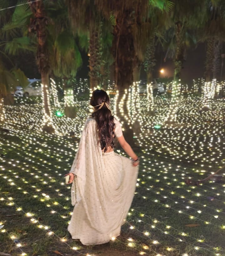 Customer photo review of Astoria Ivory Mirror Work Lehenga Set