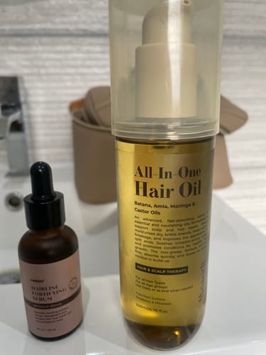 Customer photo review of All-In-One Hair Oil 200ml