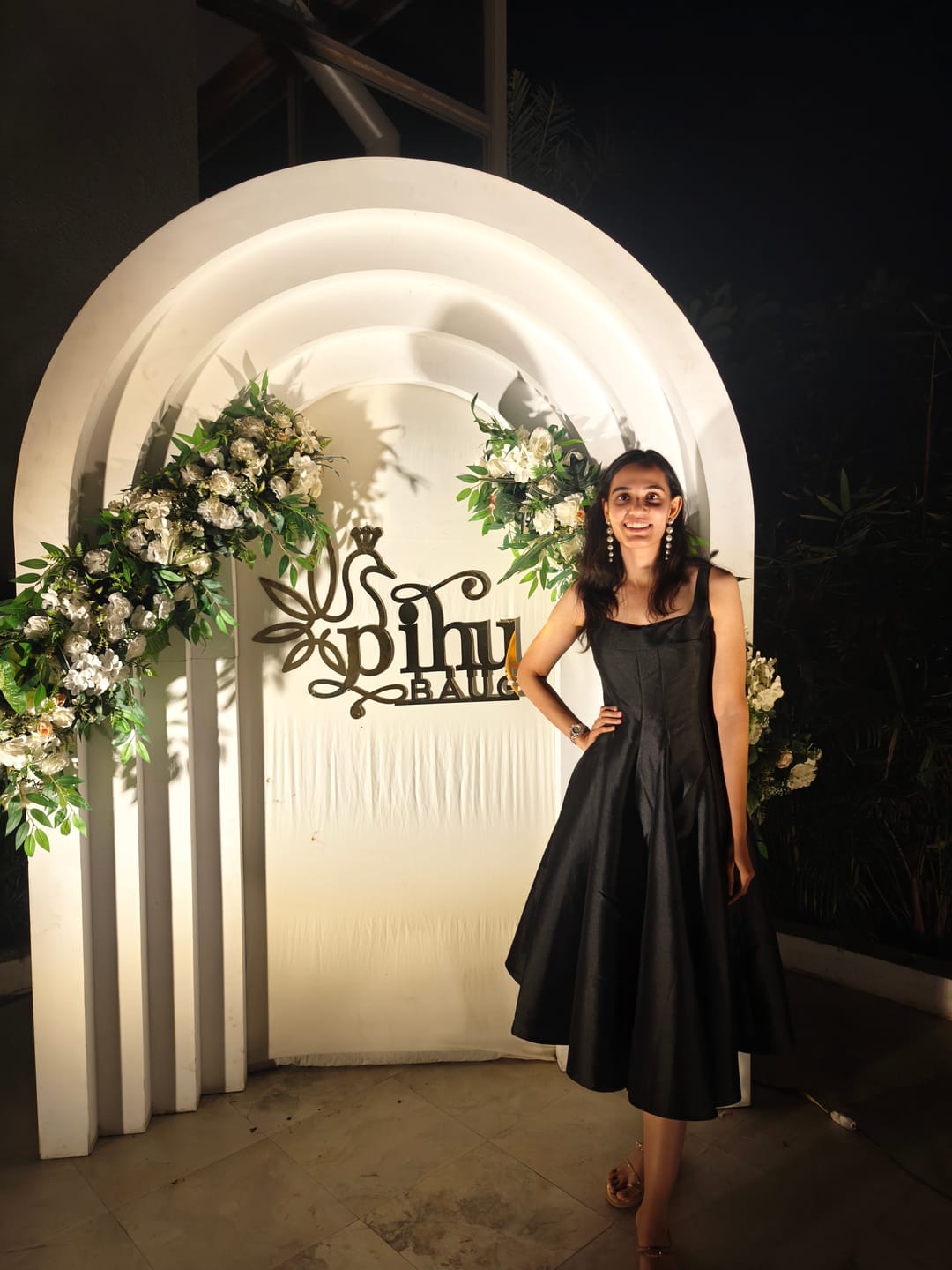 Customer photo review of Rigata Holiday Statement Maxi Dress in Black