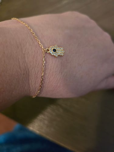 Customer photo review of Evil Eye Hamsa Charm