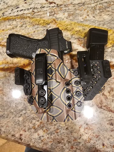 Customer's APX holster in a Noveske pattern on a countertop with a handgun and magazine.